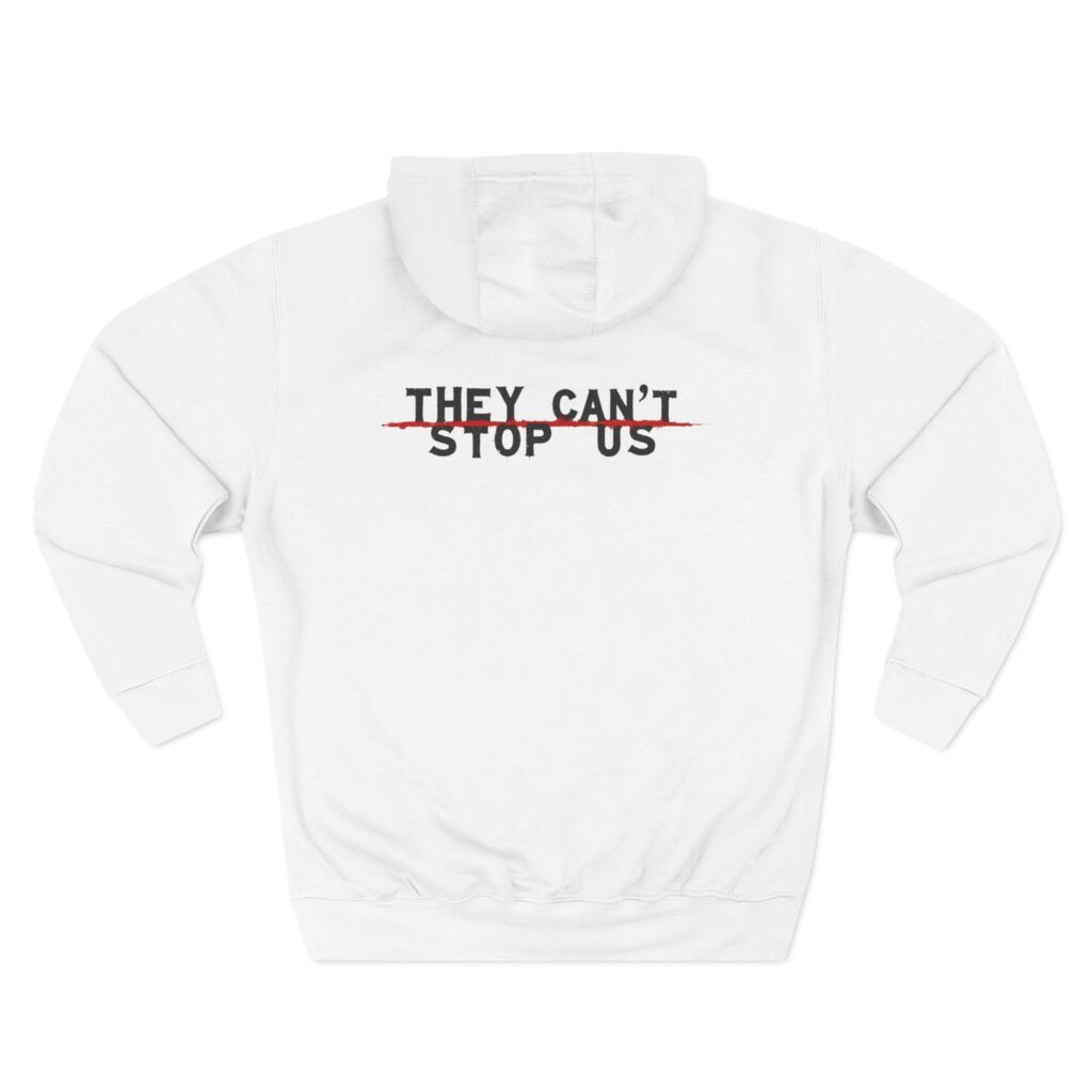 Charcoal “We Are The Watchmen” three-panel fleece hoodie with massive white “They Can’t Stop Us” backprint, adjustable hood up, floating in zero-G midnight surveillance nebula, city grid glowing beneath