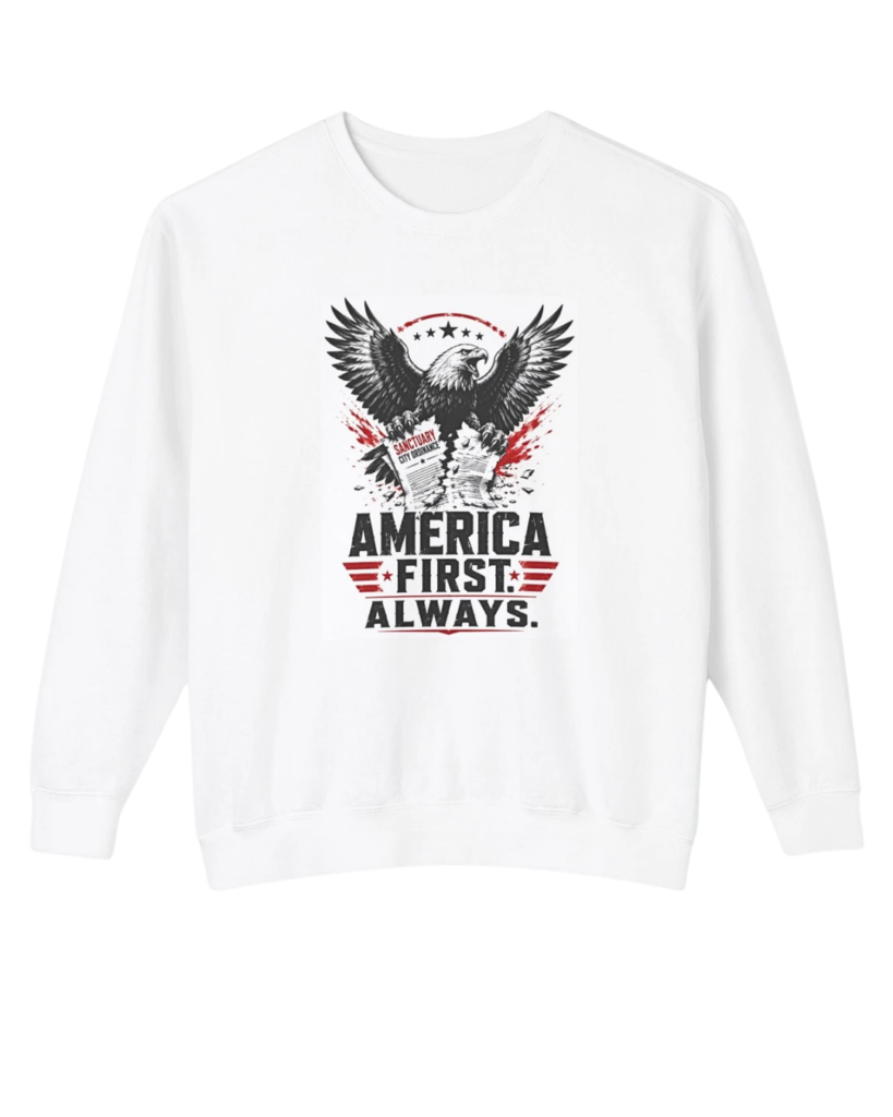 A professional product studio layout photograph showcasing the "America First Always" spread-winged eagle graphic on a clean white Comfort Colors 1466 lightweight crewneck sweatshirt, emphasizing the fine ring-spun cotton texture.